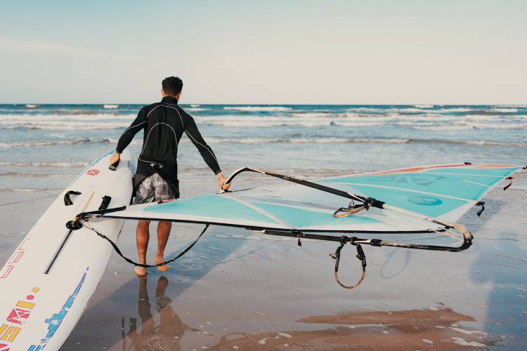 best water activities for a summer vacation in Gulf Shores wind surfing